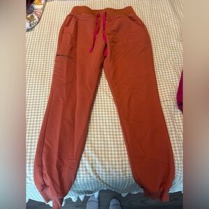 Women’s FIG scrubs Rust Orange Jogger Pants with Pink Drawstring